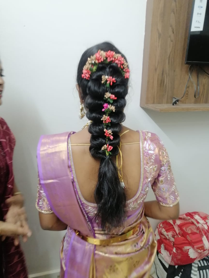 Pink Floral Braided Hairstyle